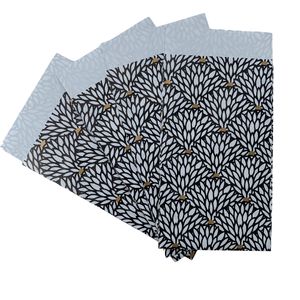 Picture 2 of Cadeauzakjes gecoat papier 7cm x 13cm wit/zwart/goud blaadjes 70gr / m2