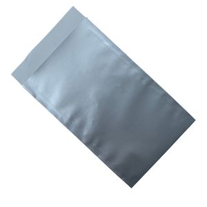 Picture 1 of Cadeauzakjes gebleekt kraft 10cm x 16cm zilver onbedrukt 70gr / m2