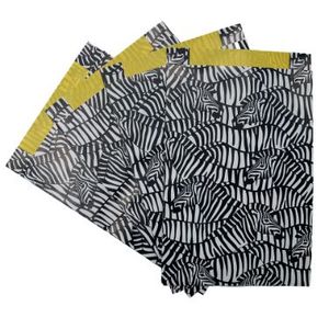Picture 1 of Cadeauzakjes gecoat papier 25cm x4cm x 34cm wit/zwart/geel zebra's 80gr / m2