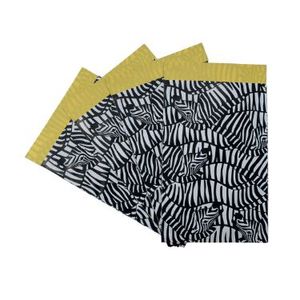 Picture 1 of Cadeauzakjes gestreken kraft 12cm x 19cm wit/zwart/geel zebra's 80gr / m2